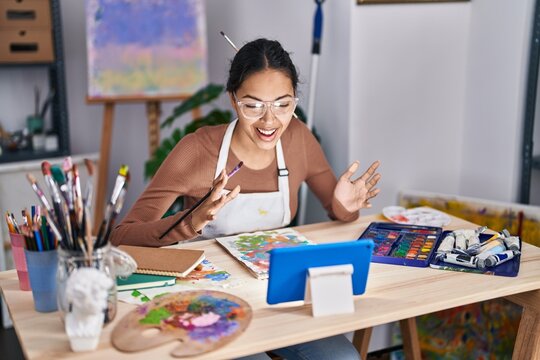 Young African American Woman Artist Having Online Draw Class At Art Studio