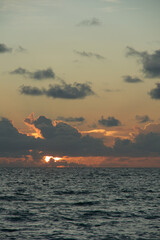 sunset sunrise over ocean sea water