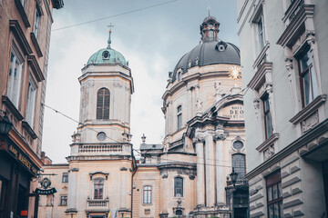 Facade of houses in Lviv, church and historical building