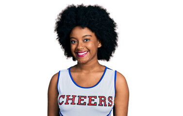 Young african american woman wearing cheerleader uniform with a happy and cool smile on face. lucky person.