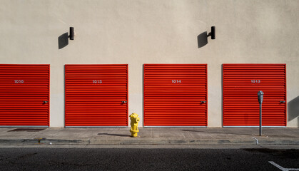 Red Doors, White Wall, and a Yellow Fire Hydrant for use as  a Cover Photograph.