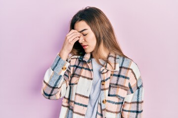 Young caucasian girl wearing casual clothes tired rubbing nose and eyes feeling fatigue and headache. stress and frustration concept.