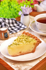A slice of delicious lemon aloe vera pie served on table  