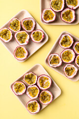 Fresh passion fruit in natural plate on yellow background, Tropical fruit in summer season
