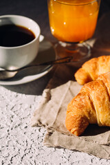 delicious breakfast, coffee and croissants on the table