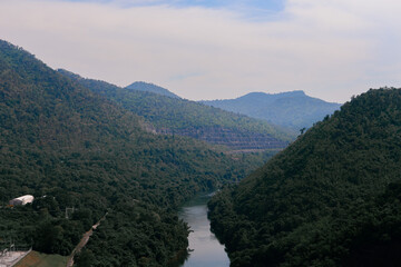 Beautiful wide view on dam with mountians and fresh blue sky 