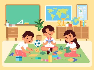Kindergarten boy and girl playing learning to make origami in the classroom
