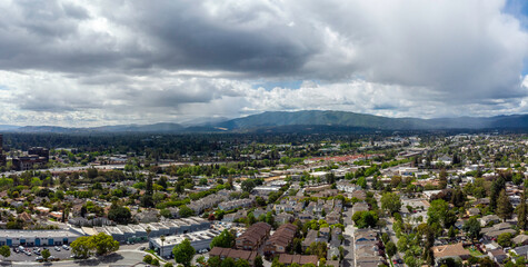 Puffy white clouds over suburbia, May 2022 - obrazy, fototapety, plakaty