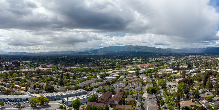 Puffy white clouds over suburbia, May 2022