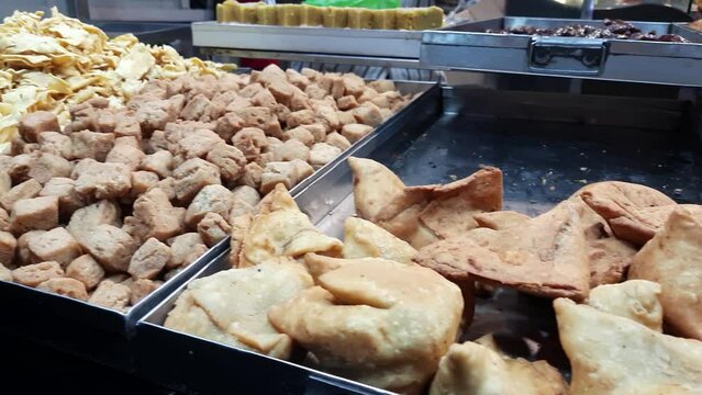 Walking around looking at the Fast Food, Street Food stalls at the Market place in India