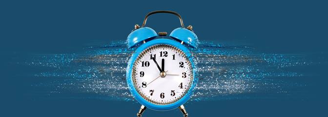 image of an alarm clock from which particles come off forming a stream. Dispersion on blue background