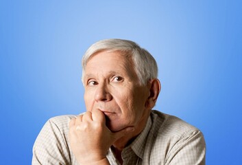 Happy man posing on the color background