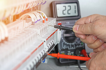 Measurement of control panel parameters using a digital multimeter.Sunflare.