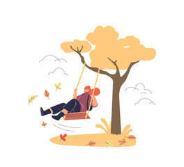 Girl riding on swing in autumn park. Young woman enjoy spending time outdoors in forest