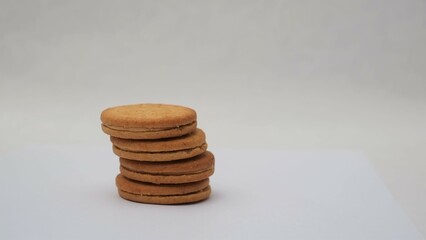 Stack of wheat biscuits isolated on white background