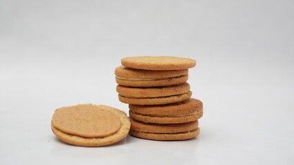 Fototapeta na wymiar Stack of wheat biscuits isolated on white background