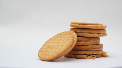 Stack of wheat biscuits isolated on white background