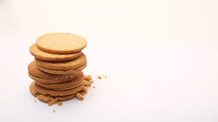 Stack of wheat biscuits isolated on white background