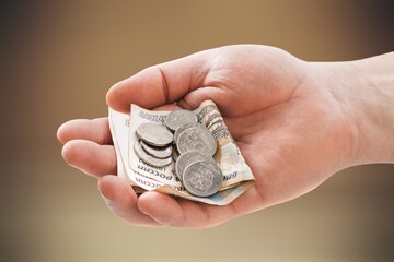 Bunch of Russian rubles are counted in the human hand
