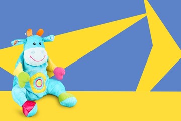 World Down Syndrome Day background. Down syndrome awareness symbol. Toy on yellow and blue background.