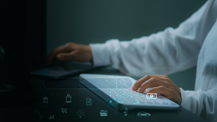 A business woman searching for information on a laptop.