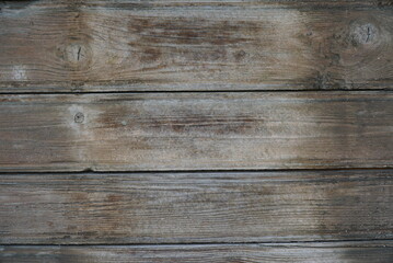 Fototapeta premium Texture of an old fence made of wooden boards close-up