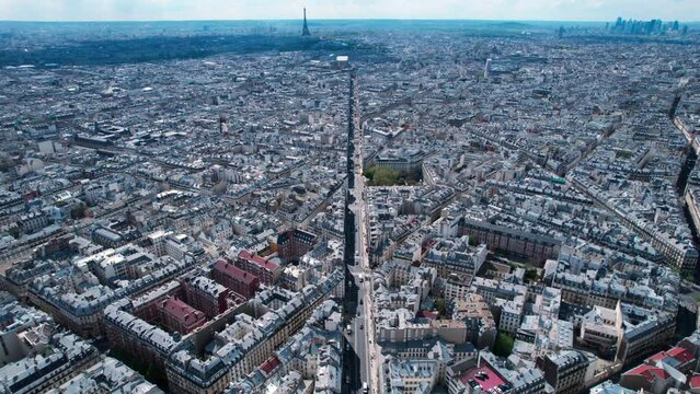 Bird's aerial view of Paris cityscape traffic street, rising up, France, day