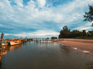 Fototapeta na wymiar Beach at the Fisherman village during sunset in Kuantan, Pahang.