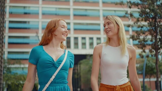Cinematic storytelling footage of two north european beautiful young women having fun outdoor, making shopping and spending time together. 