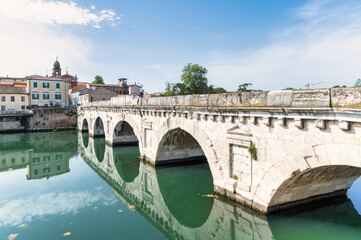 Fototapeta na wymiar The Augustus Tiberius Bridge in Rimini