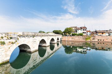 Fototapeta na wymiar The Augustus Tiberius Bridge in Rimini