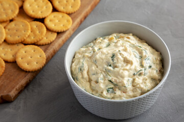 Homemade Caramelized Onion and Spinach Dip, side view.