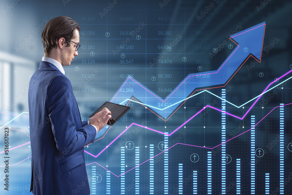 Poster businessman using pad with abstract growing business arrow and chart on blurry office interior backg