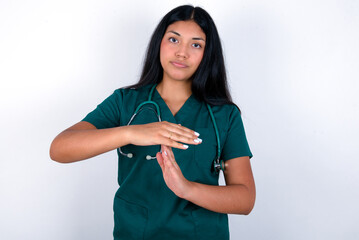 Doctor hispanic woman wearing surgeon uniform over white wall being upset showing a timeout...