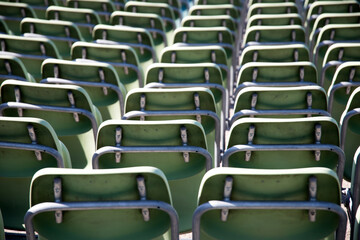 Fototapeta premium Empty Plastic Chairs at the Stadium