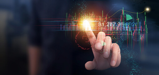 Businessman touching the glow light analyzing sales data, economic graph, strategy and planning, Digital and Stock marketing in dark color 