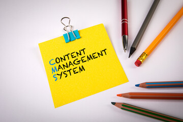 Content Management System. Stationery on a white office table
