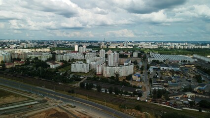 Obraz premium City block. The railway line and motorway pass nearby. Aerial photography.