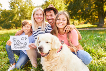 Happy family with two children and dog