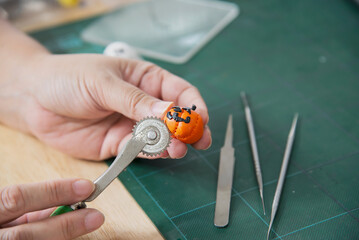 Boy is playing polymer clay