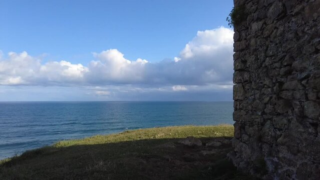 tagle cliff with castle and camera passing through window
