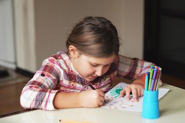 Cute little girl holds her drawing molecule Corona virus Omicron. World health coronavirus outbreak infectious disease and global deadly virus health risk and flu spread or coronaviruses influenza.