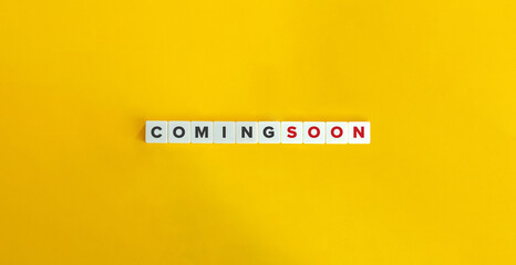 Coming Soon Banner. Text on Block Letter Tiles on Yellow Background. Minimal Aesthetics.