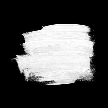 White brush painted acrylic isolated on black background. Image.