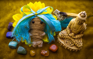 Magic doll for attracting love, rite with voodoo and fate creation, details on a table of witch,...