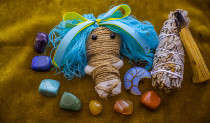 Magic doll for attracting love, rite with voodoo and fate creation, details on a table of witch,...