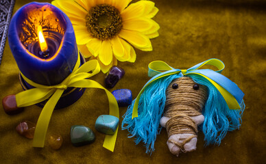Magic doll for attracting love, rite with voodoo and fate creation, details on a table of witch,...