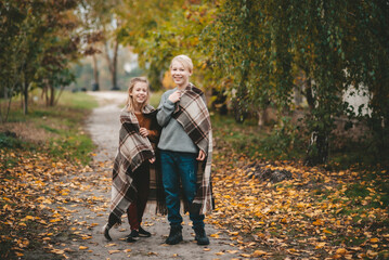 couple walking in autumn park
