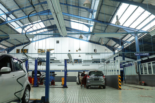 Bandung, Indonesia - January 19, 2022 : Car Repair Shop, Cars Serviced On Service Station