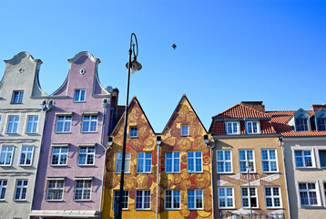 Fototapeta na wymiar facades of residential townhouses, Szeroka street, old town of Gdansk, Pomerania, Poland, Europe
